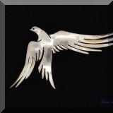 J070. Sterling silver phoenix pin. - $26 